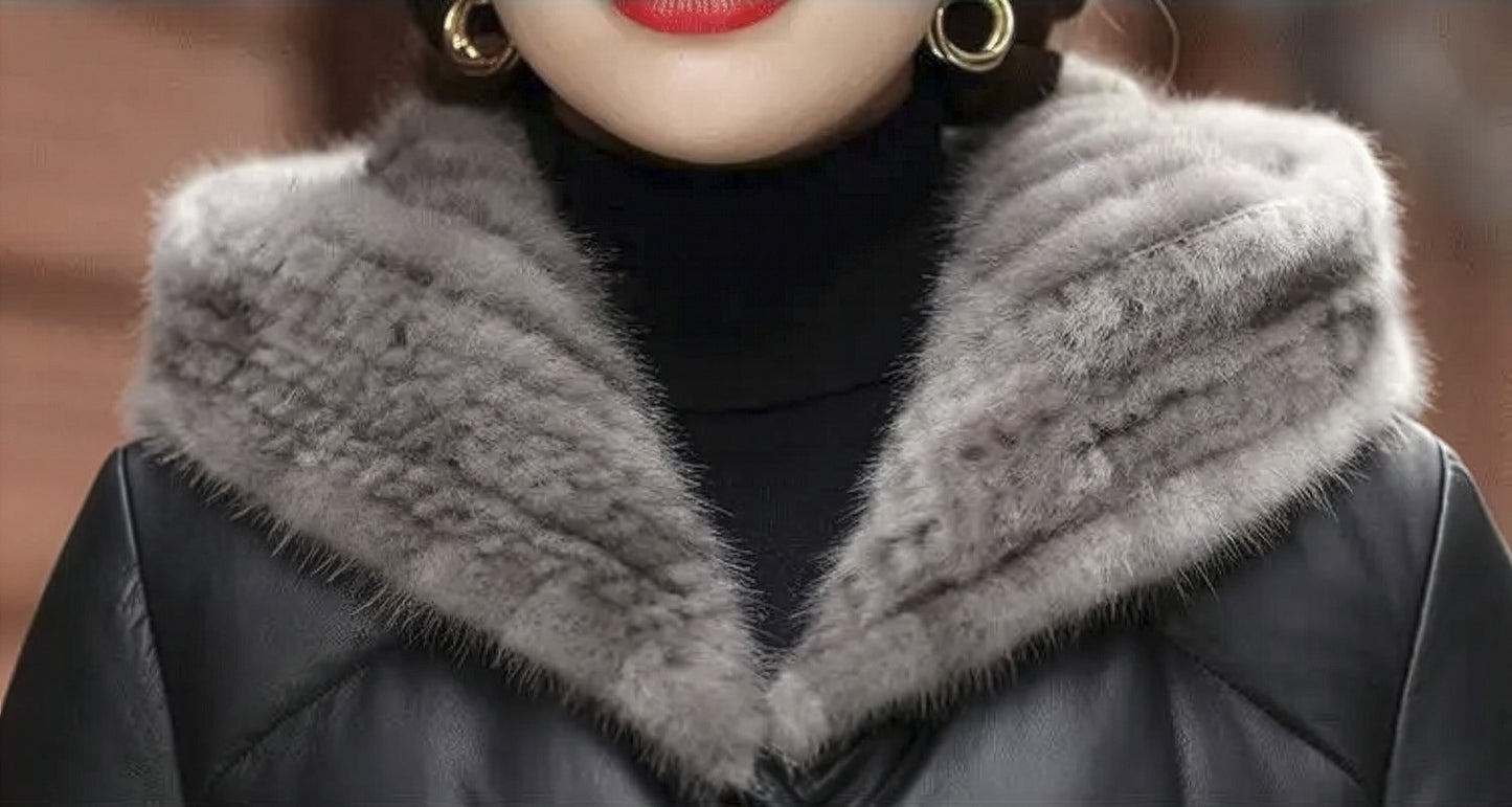Close view of the upper part of the Onyx sheepskin coat with mink-lined hood — From Borcelleclothes