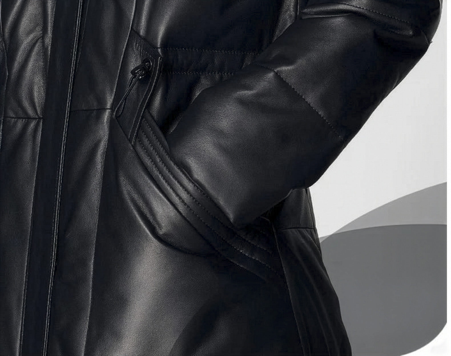 Women's Sheepskin Coat with Hidden Casing in Onyx — model with hand in pocket, close-up view-. From Borcelleclothes.