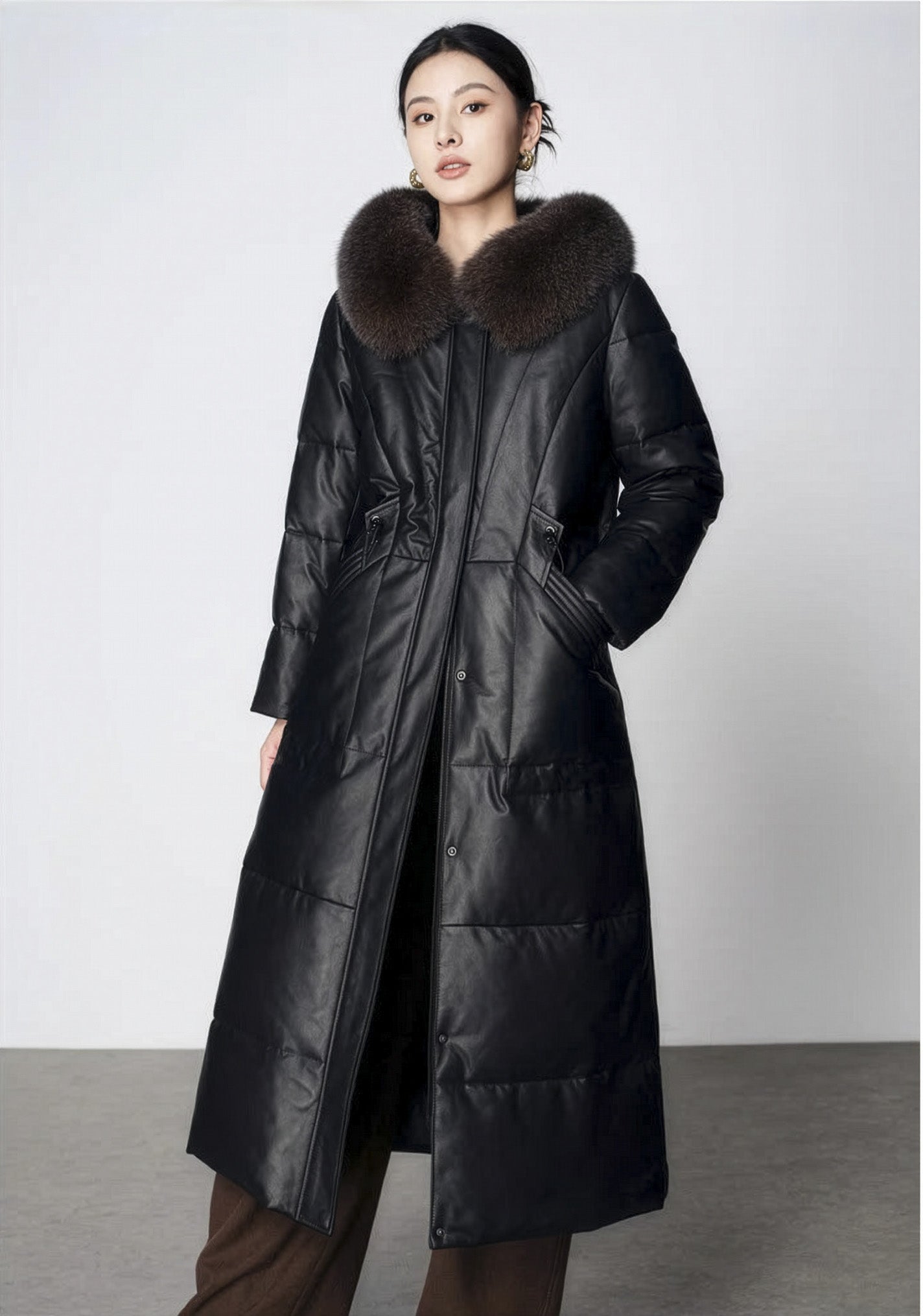 Women's Sheepskin Coat with Hidden Casing in Onyx — model with hand in pocket. From Borcelleclothes.