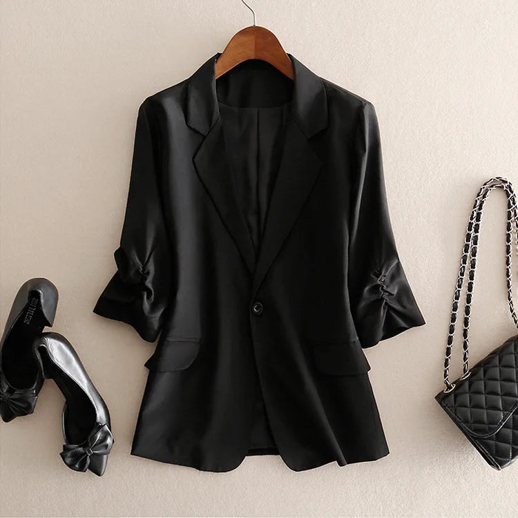 Women’s Mulberry Silk Crepe de Chine blazer in Onyx — a soft, lightweight layer with 3/4 gathered sleeves and a single-button closure, designed as a quiet companion in a gentle, feminine hue. From Borcelleclothes.