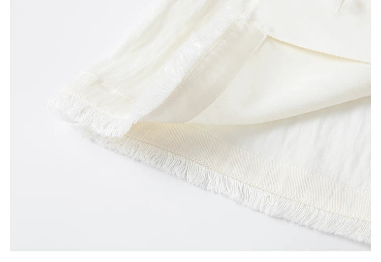 Bottom hem of the Spring Wood top unfolded to show detail. From Borcelleclothes.