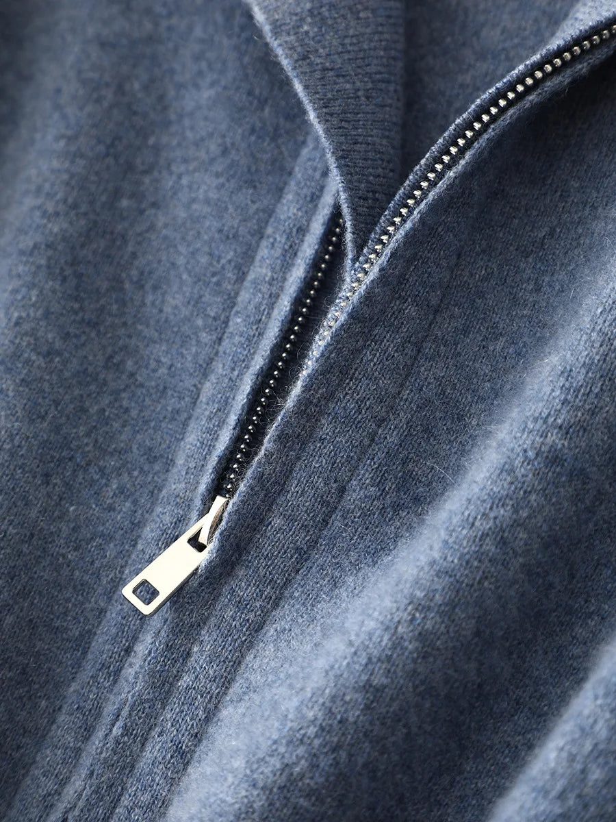 Close-up of unzipped cashmere cardigan in Frosted Blueberry showing zipper puller and front knit edge — From Borcelleclothes.