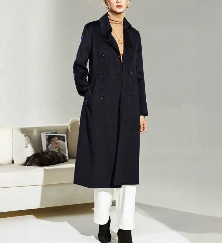 Women's Structured Wool Coat in Mirage—a mid-calf double-breasted silhouette with a pointed collar, adjustable belt, and a regal hue. From Borcelleclothes.