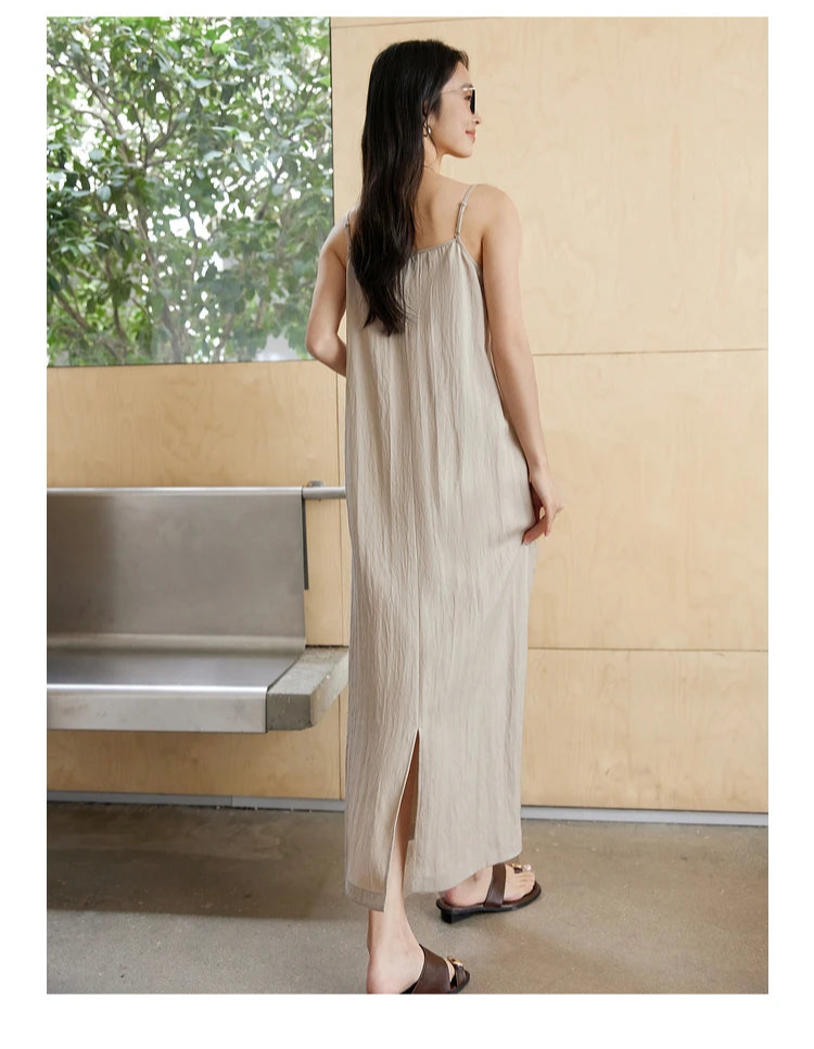Back view of the Swiss Coffee two-piece set — showcasing dress with back vent. From Borcelleclothes.
