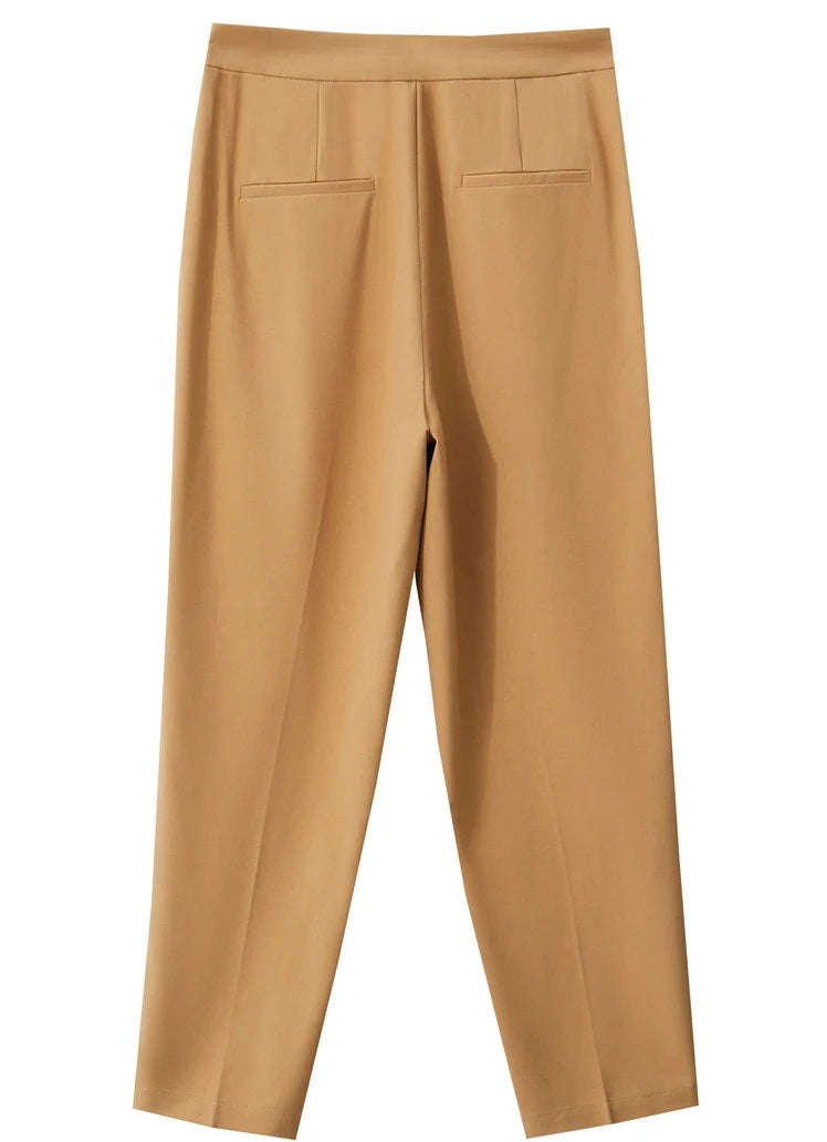Back draping of Sand Brown trousers, emphasizing the soft structure and clean lines.  From Borcelleclothes.