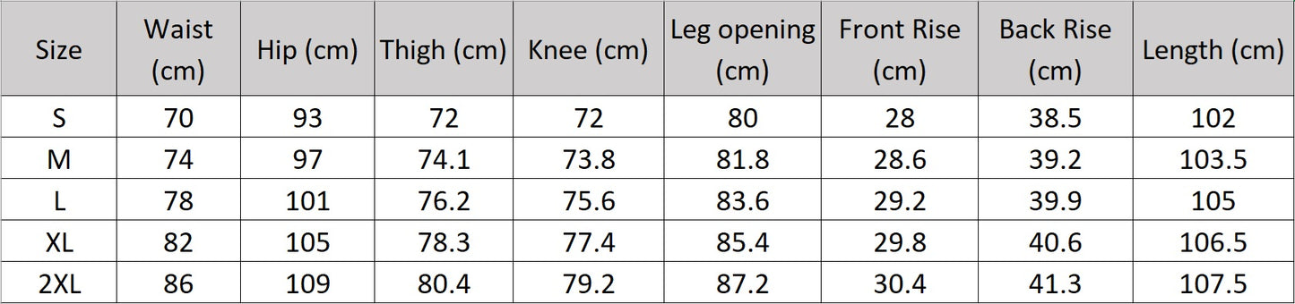 Women’s size chart for tailored draped trousers, featuring deep sculptural pleats and soft belt loops, styled with minimalist top and relaxed posture. From Borcelleclothes.