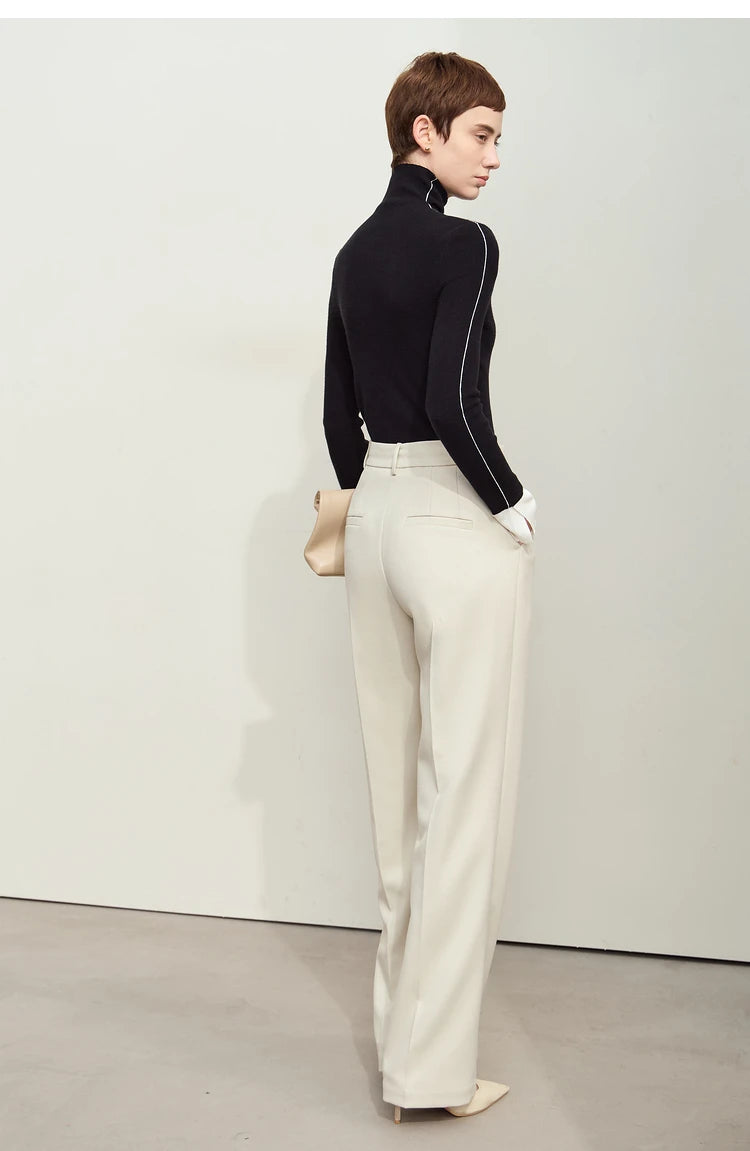 Back view of model wearing Moon Mist trousers — softly structured drape and straight-leg silhouette. From Borcelleclothes.