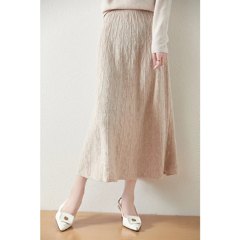 Women's A-line merino wool skirt in Pale Silver, with vertical and wave-textured knit, mid-calf length, in soft premium fabric — From Borcelleclothes.