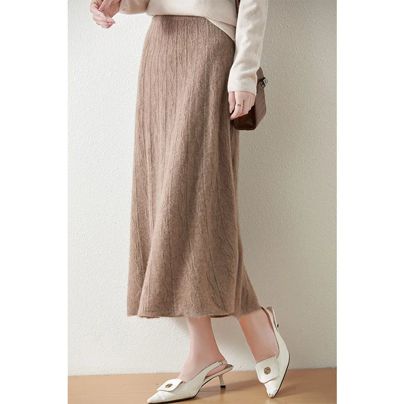 Pale Taupe textured merino skirt, model turned slightly to the side, showing calm silhouette and vertical texture — From Borcelleclothes.