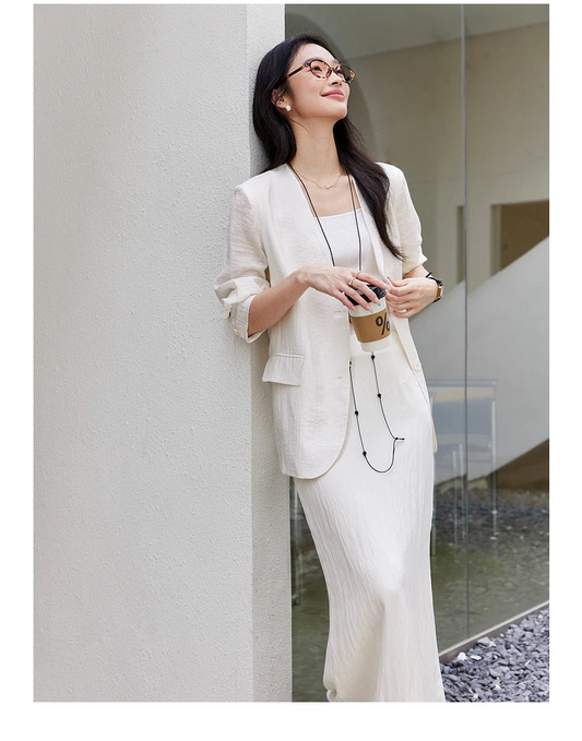 Women's textured pinstripe crinkle blazer in Pearl Bush, hip-length with a clean V-neckline, defined by freedom. From Borcelleclothes.