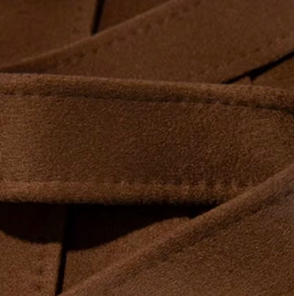 The adjustable waist belt on the Women's Tibetan Cashmere Coat in Baker’s Chocolate. From Borcelleclothes.