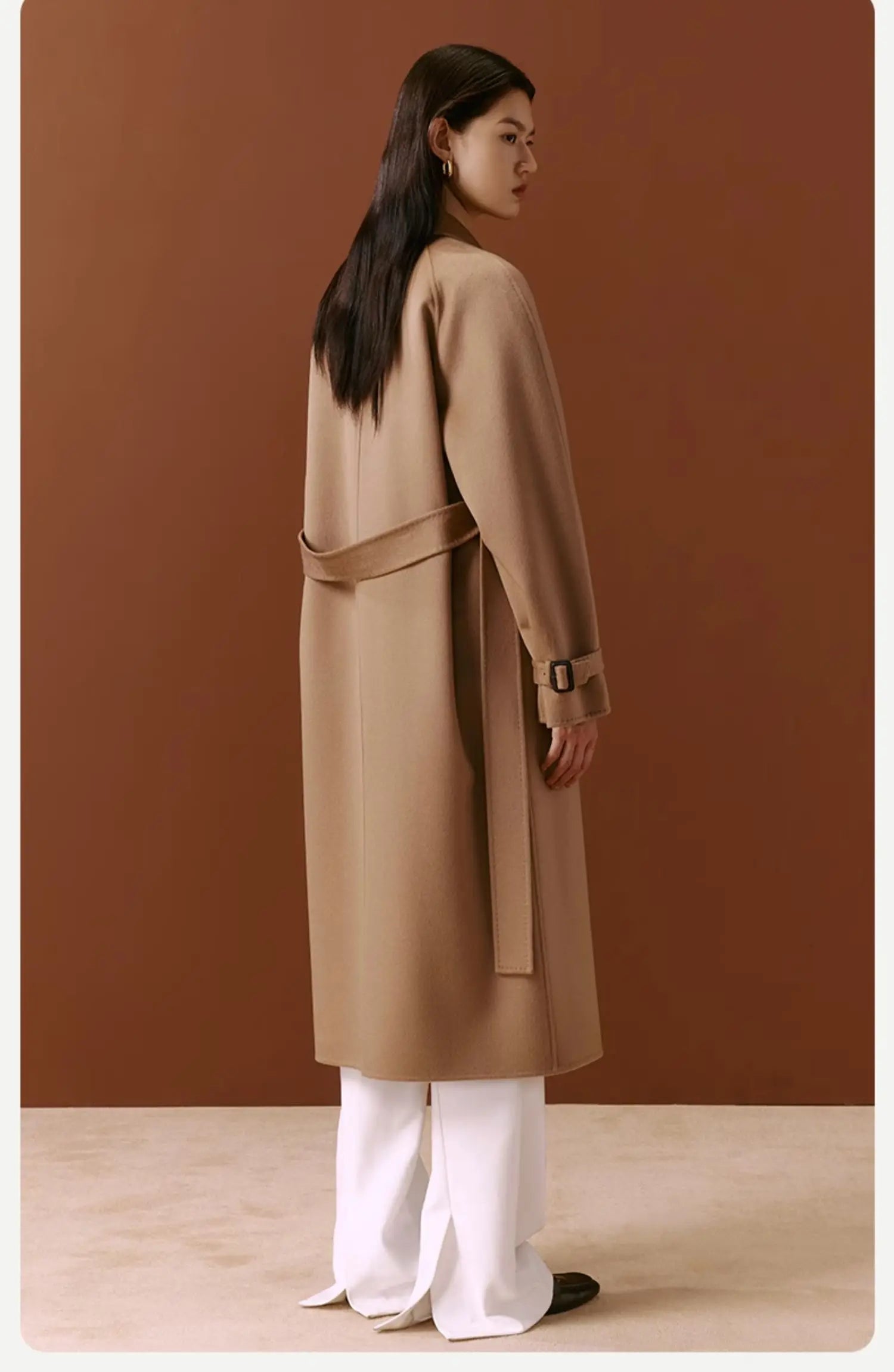 The back of the Women's Tibetan Cashmere Coat in French Beige, showcasing the luxurious cashmere texture and tailored design. From Borcelleclothes.