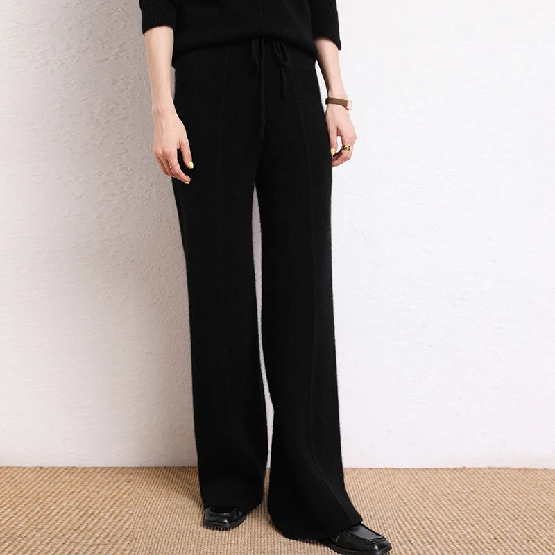 Traced Seaming Cashmere Trousers in Onyx, model with foot side — From Borcelleclothes.
