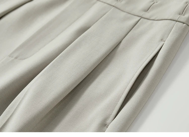 Close-up of the side pocket on foggy grey trousers, emphasizing refined construction and clean finishing. From Borcelleclothes.