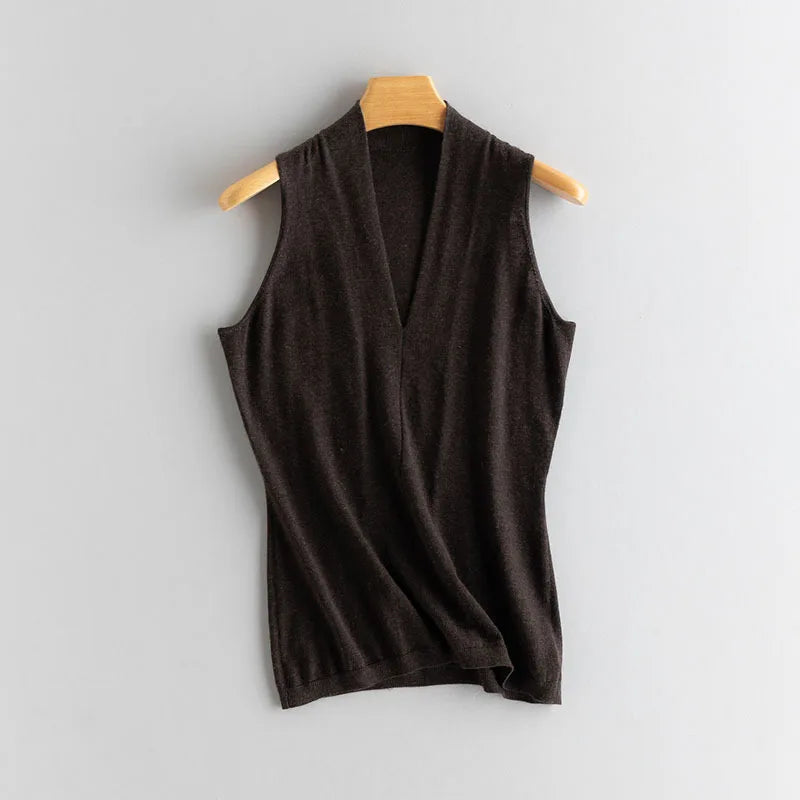 Women’s V-neck cashmere top in Black Coffee, with soft front draping and a sculptural collar framing the neckline — From Borcelleclothes.