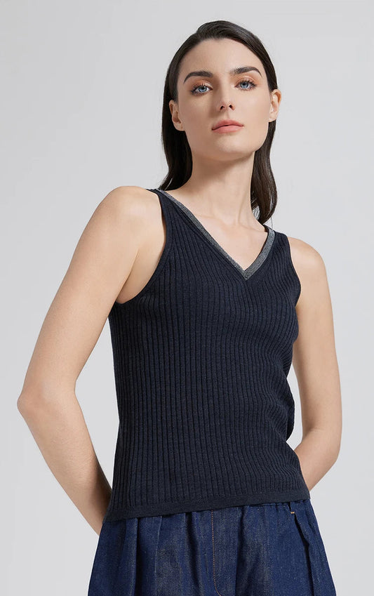 Model in Black Pearl wide-rib V-neckline top with hands placed behind the back. From Borcelleclothes.