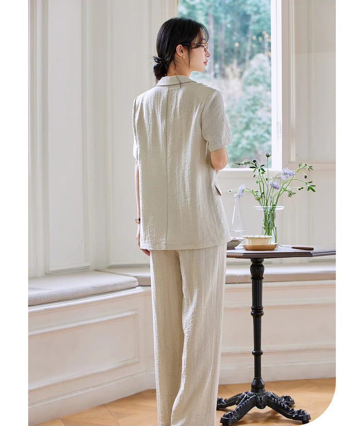 Back view of the two-piece set, showing relaxed structure and texture. From Borcelleclothes.