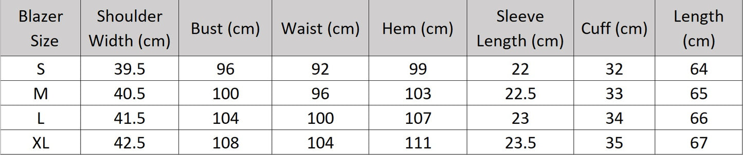 Women's size chart for a blazer of the two-piece set in Wild Sand, featuring a short-sleeved blazer with notch lapels and crinkled wide-leg trousers, shown in natural light. From Borcelleclothes.