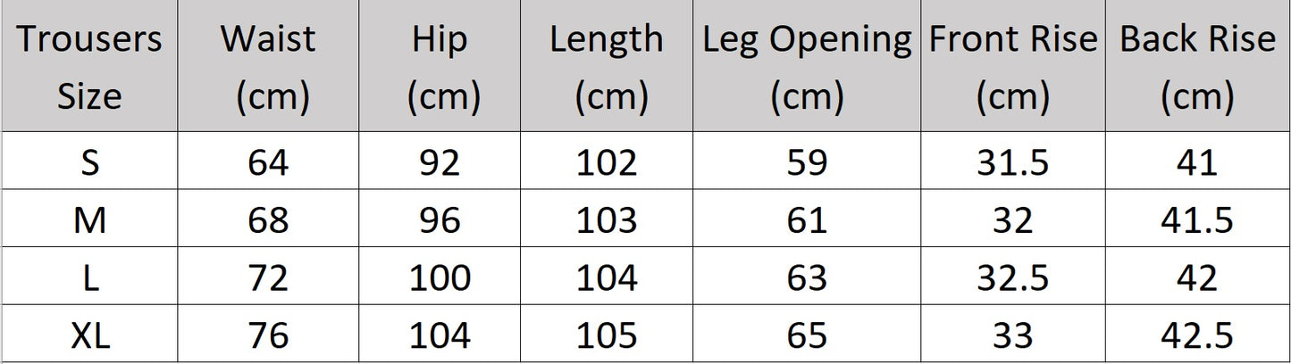 Women's size chart for trousers of the two-piece set in Wild Sand, featuring a short-sleeved blazer with notch lapels and crinkled wide-leg trousers, shown in natural light. From Borcelleclothes.