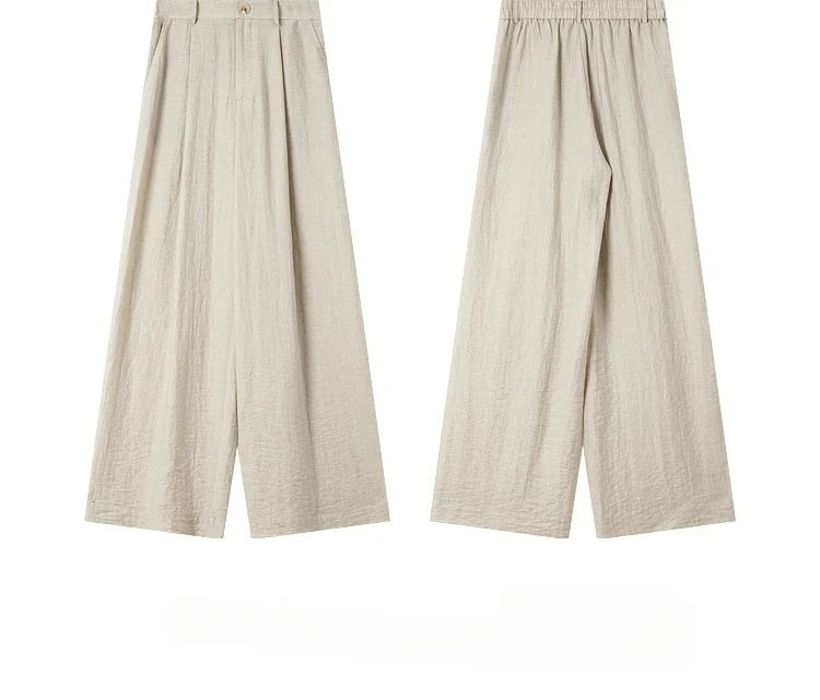 Front and back views of the trousers, highlighting pleats and fall. From Borcelleclothes.