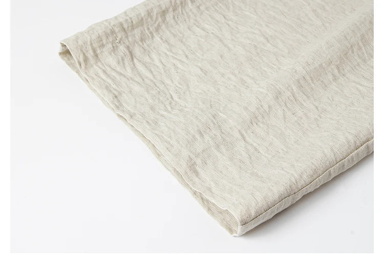 Bottom hem of the wide-leg trousers, emphasizing the airy cut. From Borcelleclothes.