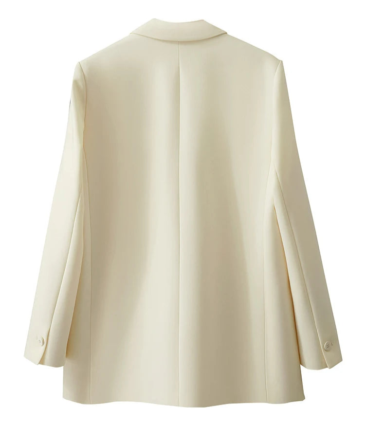 Back view of women’s Pearl Bush wrap blazer with golden pendant – From Borcelleclothes.