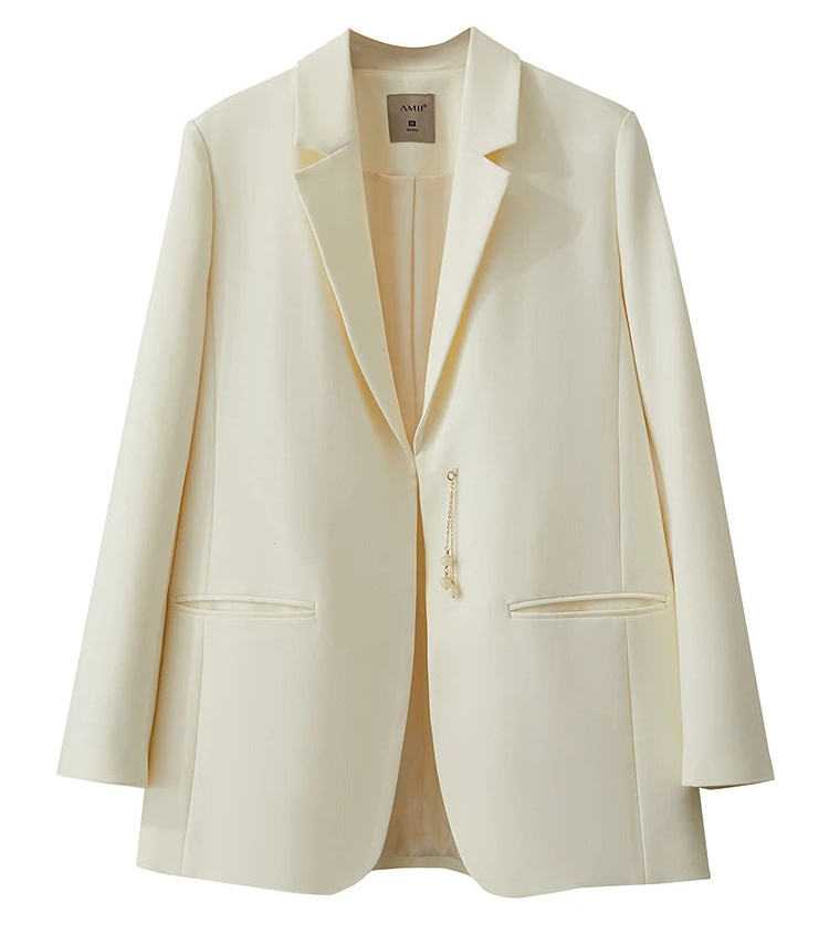 Front view of women’s Pearl Bush wrap blazer with golden pendant – From Borcelleclothes.