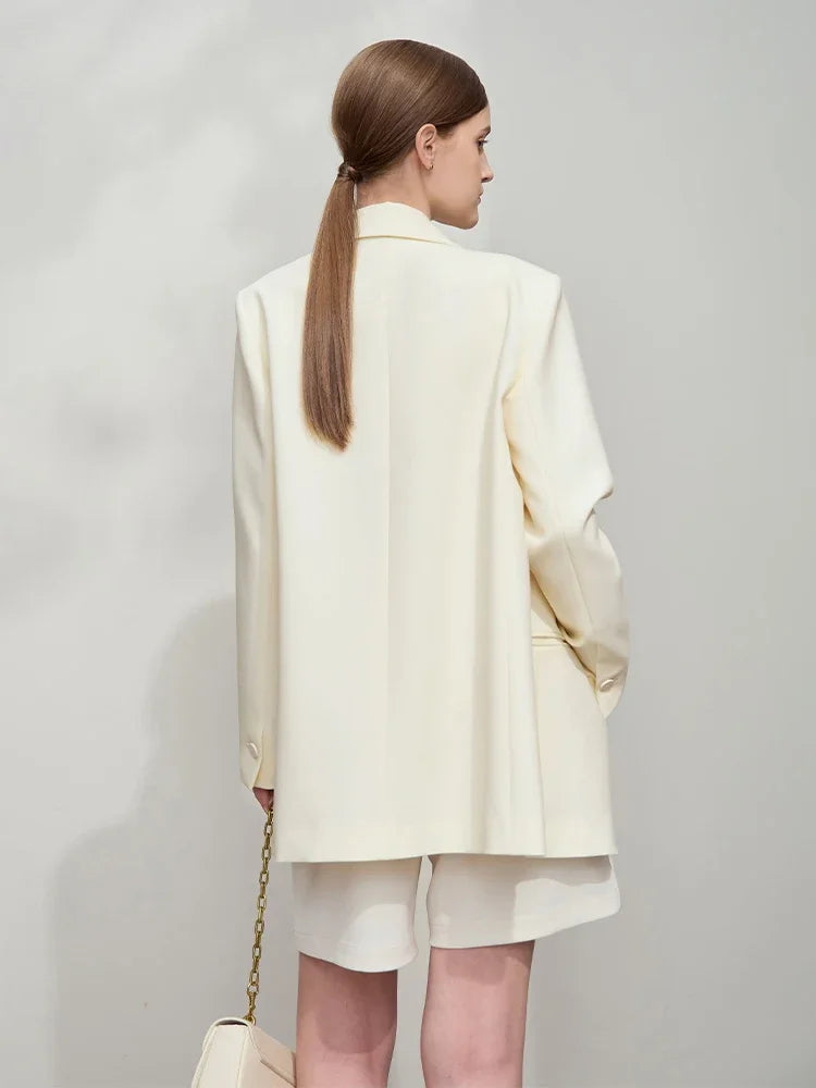 Back view of women’s Pearl Bush wrap blazer with golden pendant – From Borcelleclothes.