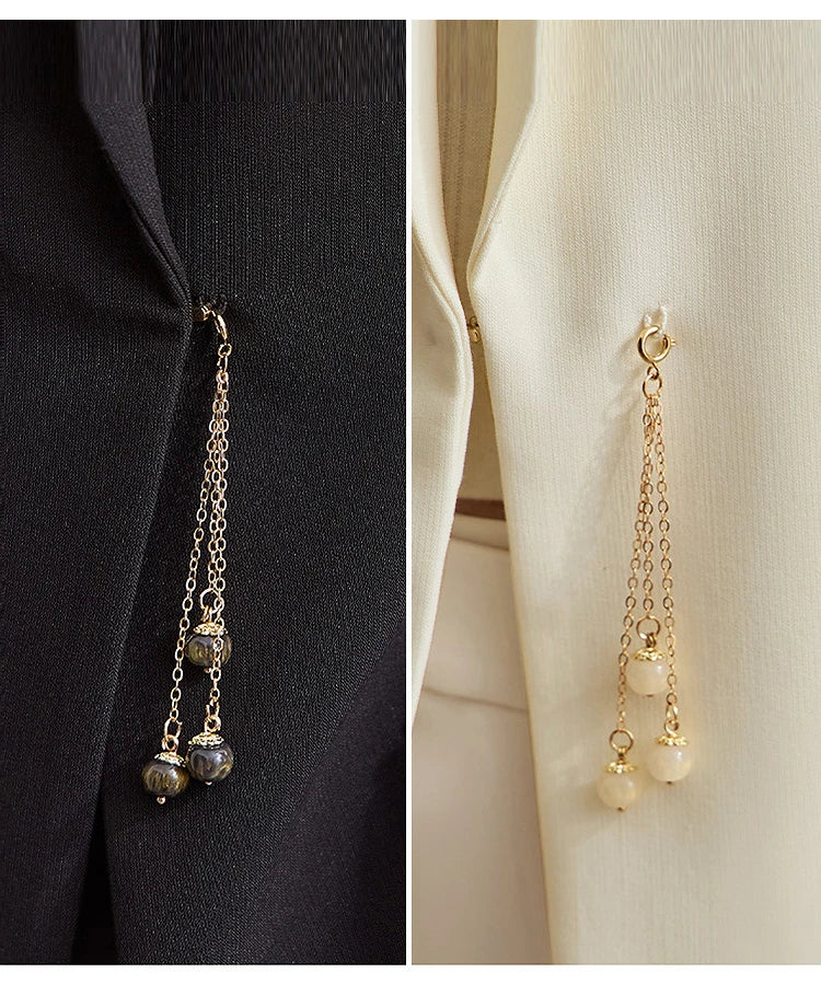 Collage of Pearl Bush and Onyx blazers' sections with golden pendant – From Borcelleclothes.